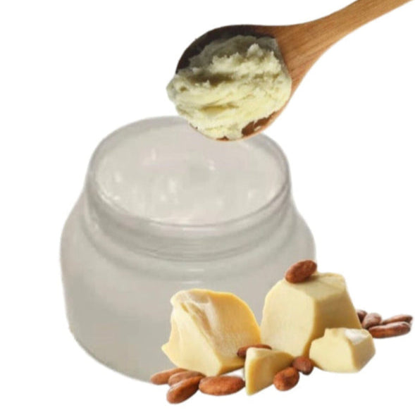 Jar of cream with a wooden spoon, cheese, and nuts on a white background